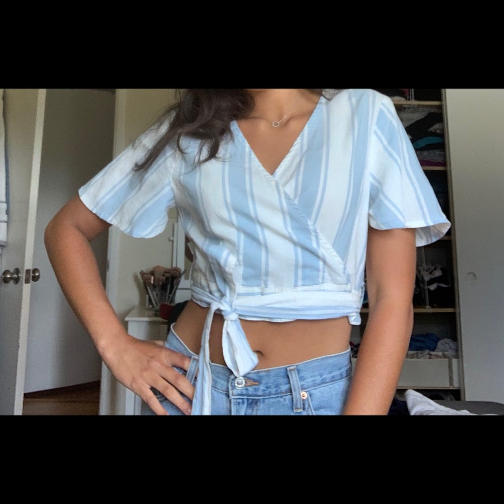 Adorable summer blue and white striped tie blouse!